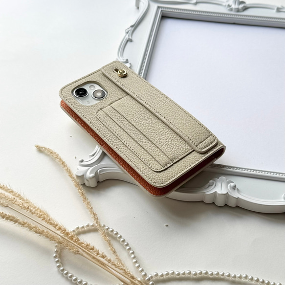 手帳型スマホケース　本革　名入れ可　カード収納　ハンドベルト付き　iphoneケース Ivory+Orange