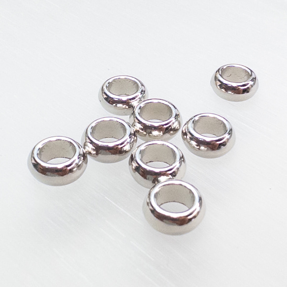 ＊25個入り＊ 大穴 プラスチックビーズ ロンデル 銀色 約10x4mm ドーナツ bz091