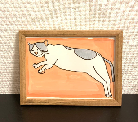 寝転んでる猫の絵