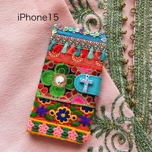 【iPhone15 2日以内発送】エスニックな ターコイズブルー刺繍 手帳型iPhoneケース 手帳型スマホケース