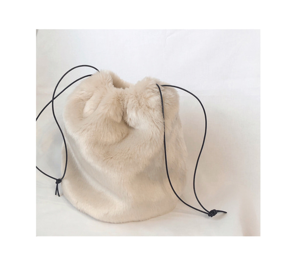 Eco fur drawstring bag pale beige