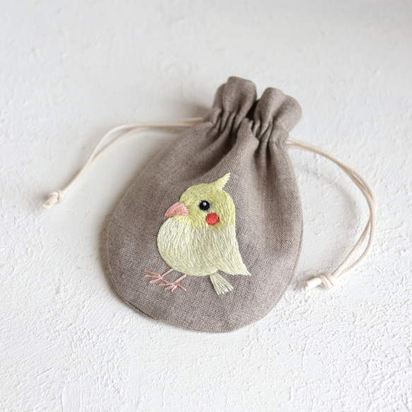 【サイズ・ポーチ変更可】オカメインコさんの刺繍リネンミニ巾着