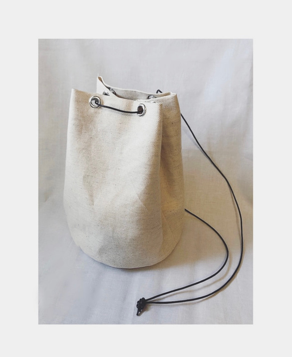 Narrow handle bag