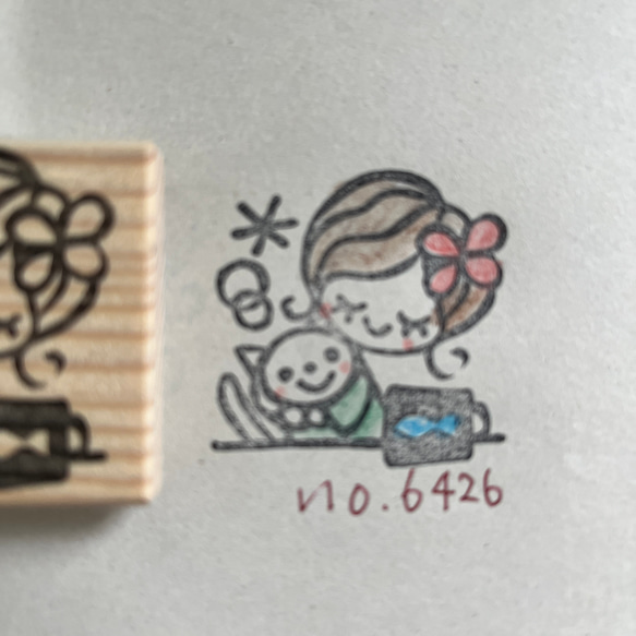 スタンプ　No. 6426猫を抱えた女の子